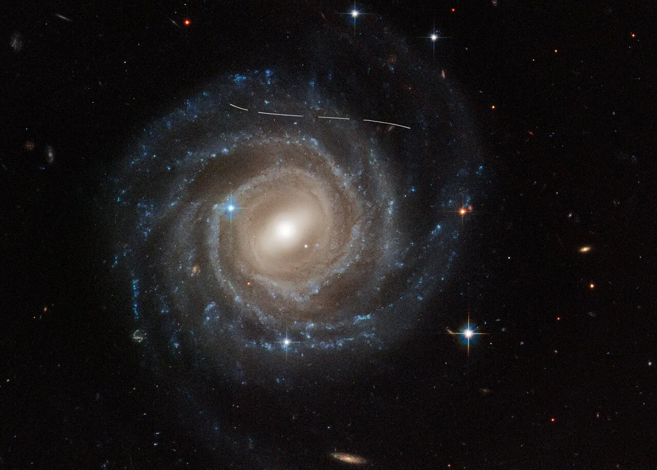 Asteroid photobombs Hubble snapshot of Galaxy UGC 12158